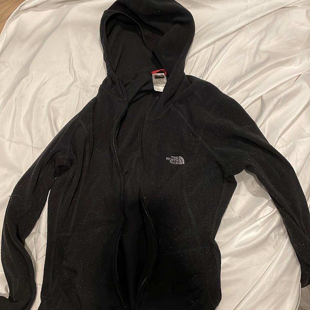 The North Face, black zip up hoodie.